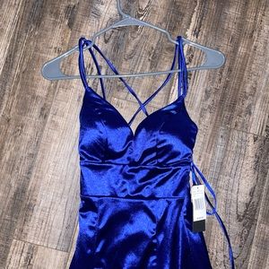 Long Navy blue dress. Brand new with tags never worn. Size 0.